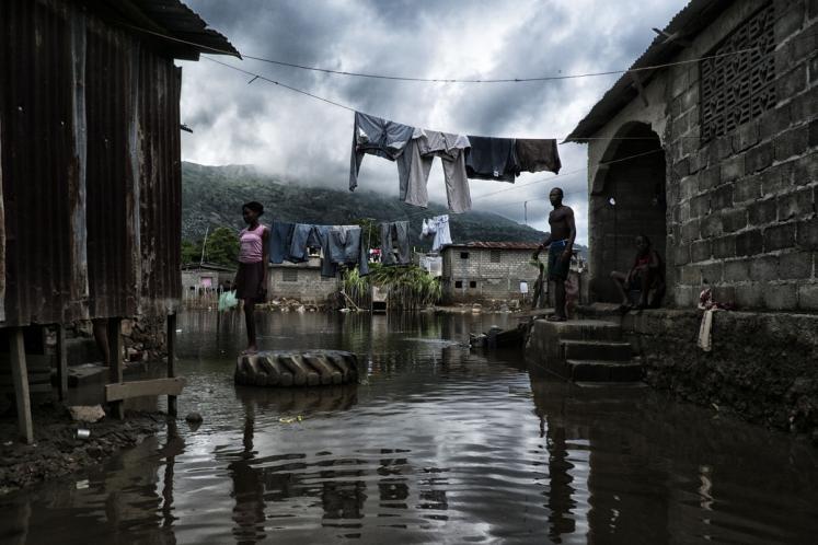After days of continuous rains parts of Haiti’s north including Cap Haitian suffered serious flooding leaving more than a dozen dead and thousands homeless.